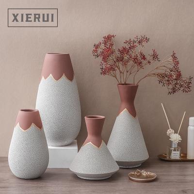 China Hot Selling Minimalist Creative Morandi Ceramic And Modern Luxury Nordic Tabletop Porcelain Flower Vase For Home Decor for sale