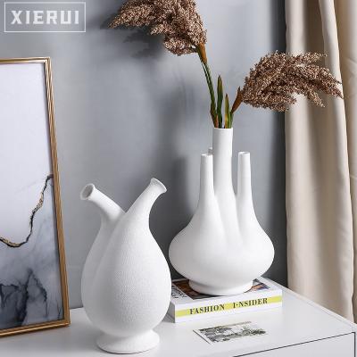 China Creative Unique Modern Minimalist Wabi White Nordic Sabi Vase Flower Ceramic Vase For Home Decor Accessories for sale