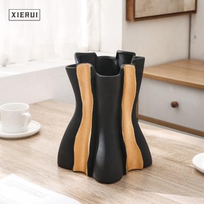 China Modern Luxury Handmade Irregular Ceramic Vase Shaped Unique Nordic Minimalist Porcelain Set Ornaments For Home Decor for sale