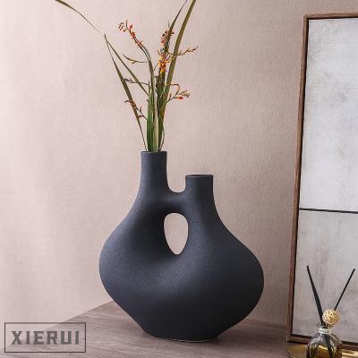 China Modern Minimalist Creative Nordic Wabi Sabi Candlestick Table Vase for Home Decor Unique Shaped Living Room Hotel Ceramic Vase Ornaments for sale