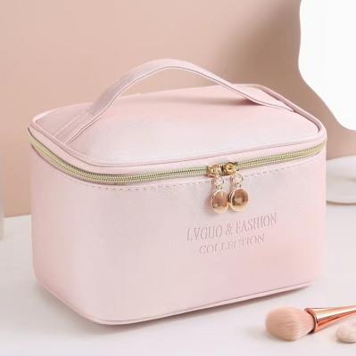 China Lady New Product Waterproof Makeup Bag Sets Pink With Logo Zipper Vegan Custom Convenient Travel Shiny Leather Toiletry Cosmetic Bag for sale