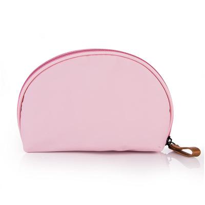 China Lightweight Custom Logo Half Moon Travel Makeup Pouch Cosmetic Bag For Girls Women for sale