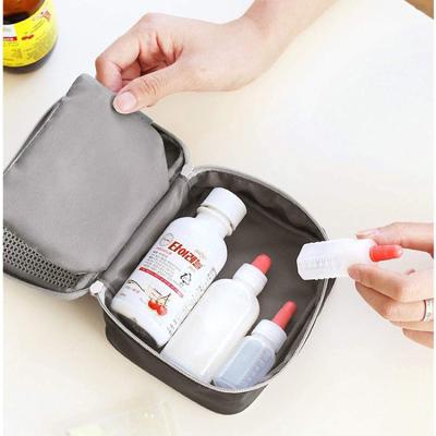 China Durable Travel Packaging Cubes Portable Mini Travel Medicine Bag For Family Outdoor Storage Medical Bag Pouch for sale