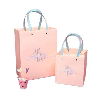 China Recyclable custom service china manufacturer factory price printing 1000 piece packaging gift paper bag for sale