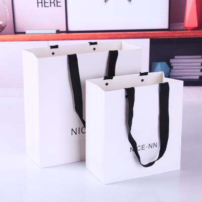 China Gift Paper Bag Gift Clothing Shopping Bag Recyclable Paper Stain Printing Logo Size Solid Color Custom Logo for sale