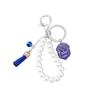 China Custom Poodle Greek Blue Sigma Letters Tassel Bag Key Chain Pearl Rho ZPHIB Gamma Key Chain For Women Bag for sale