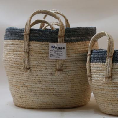 China Stocked In Straw Woven Market Handmade Woven Baskets Fruit Baskets Stock Cheap Natural Fabric Basket for sale