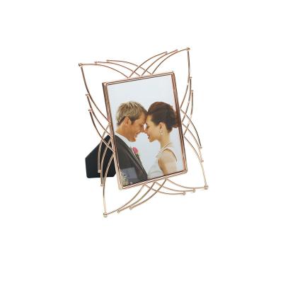 China Eco-friendly high quality metal art table wedding picture gold photo frame for home for sale