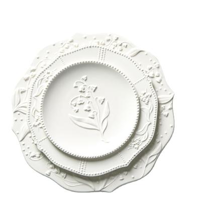 China Sustainable Europe Nordic White Relief Plates Ceramic Plates Porcelain Dishes For Different Kinds Of Foods for sale