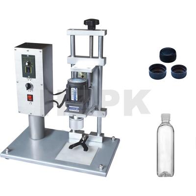 China HZPK Semi Automatic Food Twist Off Pet Bottle Plastic Cap Capping Machine For Medicine Bottle for sale