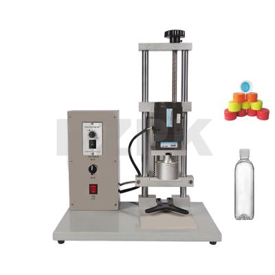 China HZPK Semi-automatic PET Food Glass Plastic Oil Bottle 38mm Close Cap Vial Screw Capping Machine for sale