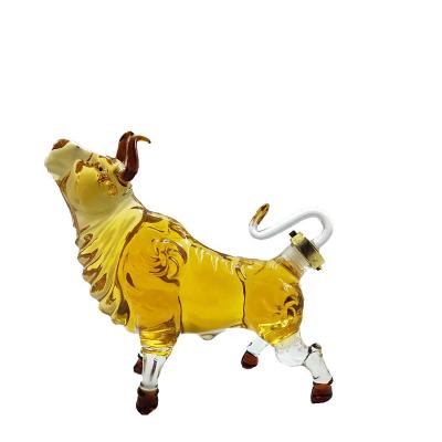 China Animal Beverage Chinese Zodiac Bull Shape Glass Wine Bottle Decanter for sale