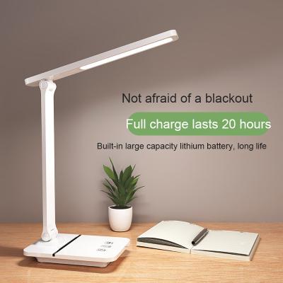 China Modern Eye-care Smart Desk Light With Phone Bracket Usb Charging Decorate Hotel Reading Study Led Desk Table Lamp for sale