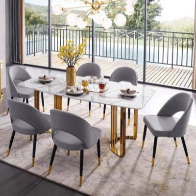 China Wholesale Modern Stainless Steel Dining Table 12 Chair Resonant Antique Dining Table for sale