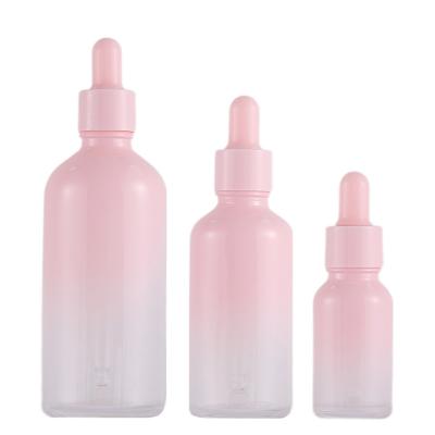 China Business& 5-100ml Gradient Buying Custom Essential Oil Glass Bottle Cherry Blossom Pink Dropper Bottle for sale