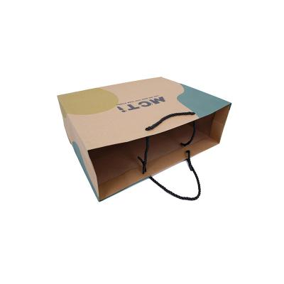 China Kraft Paper Bag Clothing And Shoes Business Recyclable Custom Luxury Paper Bags With Handle for sale