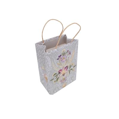 China Recyclable Kraft Paper Bags Custom Product Household Packaging Bags Paper Bags With Your Own Logo for sale