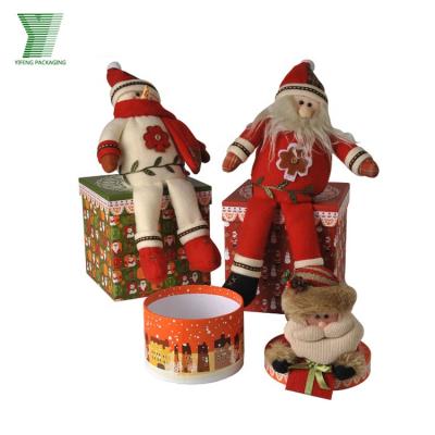 China Wholesale Handmade Christmas Gift Box Decoration Santa Doll On Top Custom Design Printing Matte Laminated Round Packing Box for sale