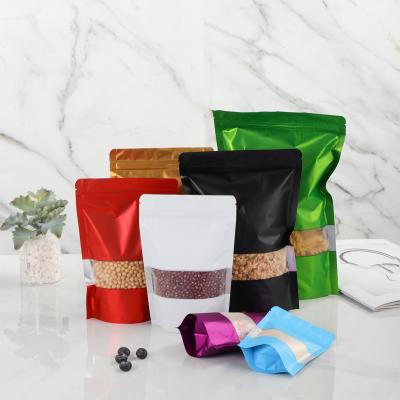 China Moisture Proof Mylar aluminum foil bags waterproof food mylar ziplock bags Resealable aluminum foil stand up bags custom tea coffee with window for sale