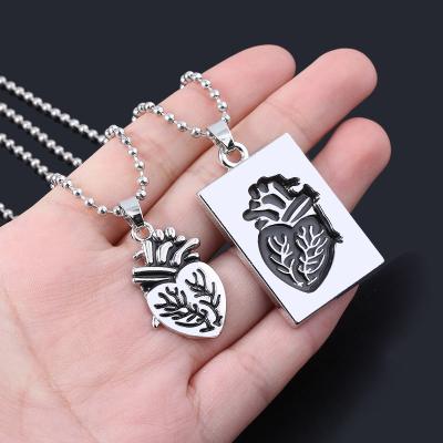 China Hiphop Jewelry Hip Hop Gold Puzzle Organ Anatomical Heart Pendant Couples Necklace for sale