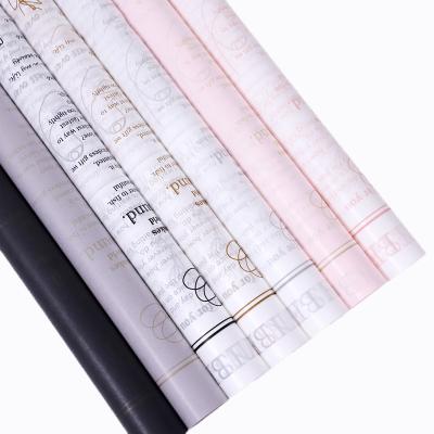 China Wholesale high quality modern thickened waterproof English newspaper waterproof bouquet wrapping paper for sale