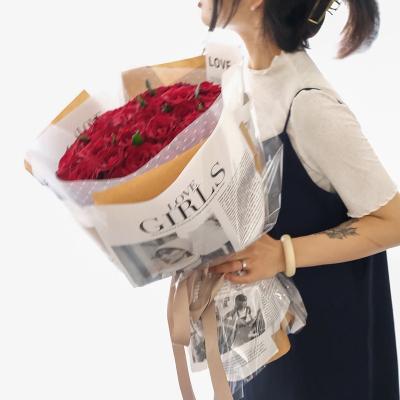 China New fashion weekly girls English newspaper wrapping paper gift box wrapping paper bouquet flowers waterproof material for sale