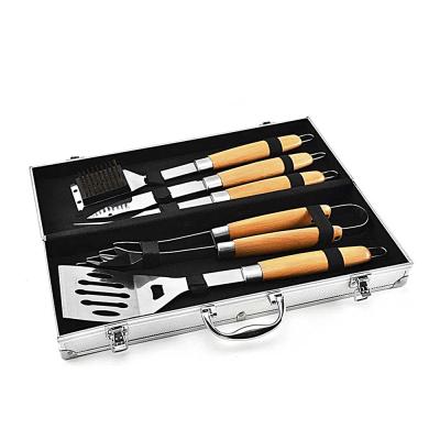 China Hot Selling Portable Outdoors Easily Assembled Stainless Steel BBQ Tool Kit The Wooden Handle BBQ Grill Accessories for sale