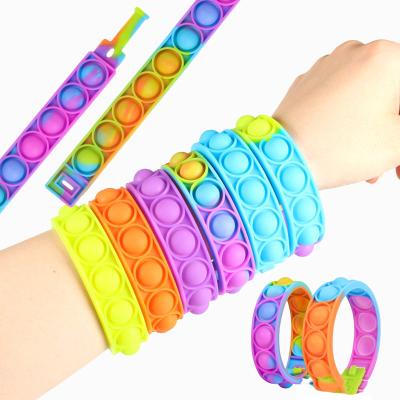 China Clear sund popping strain set silicone sj rainbow fun child band pulseira push bubble noise fidgety toy sensory wristband for sale