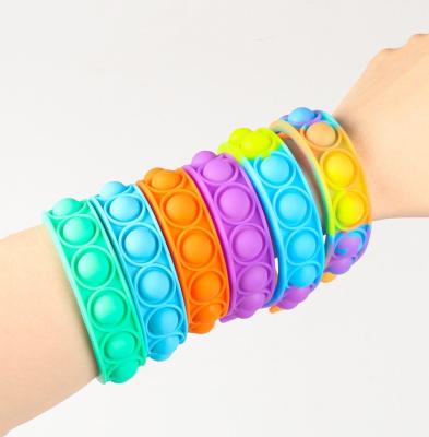 China Stress Set Silicone Rainbow Fun Child Push Band Push Watch Strap Pulsera Bubble Noise Busy Toy Sensory Bracelet Set for sale