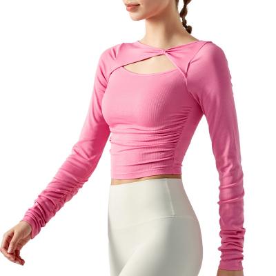 China Breathable Women fashion seamless yoga shirts sexy breathable active running fitness t-shirt wear gym long sleeve yoga tops for sale