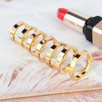 China FASHIONABLE high quality titanium steel accessories diamonds 316L stainless steel luminous inlaid gold ring simple and elegant for sale