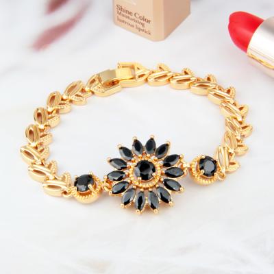 China Yue sun flower gold bracelet gold plated inlaid black stone female party FASHIONABLE women's jewelry cool social personality accessories for sale