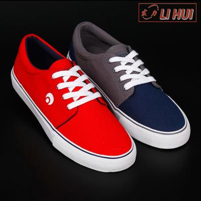 China Cotton Cloth/Rubber Canvas/Rubber Canvas Design Fashion Men's Rubber Flat Sports Shoes for sale