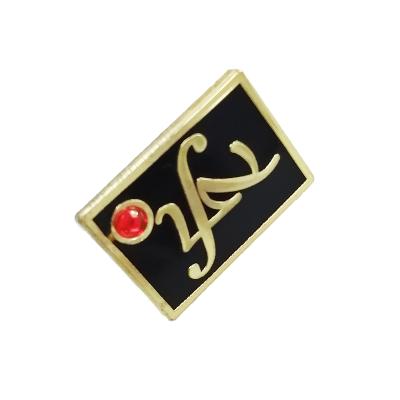 China Luxury Europe Enamel Lapel Pins Gold Plated Black Hard Enamel Pin Badges With Red Diamond Attached for sale