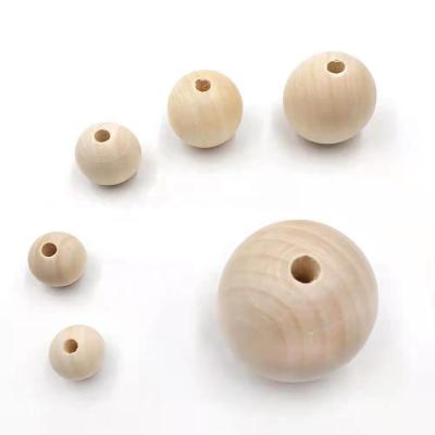 China Decoration 12mm 16mm 20mm and other sizes natural wood beads for DIY wreath toys jewelry accessories and wall door home decoration for sale