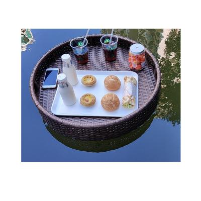 China Seaside Popular Sustainable Pool Food Serving Tray Basket Rattan Bali Swimming Floating Tray for sale