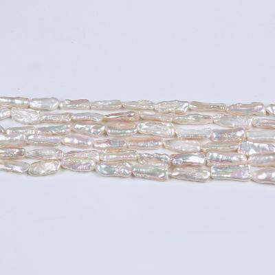 China Freshwater Pearl 2021 Hot Wholesale Read White Long By Drilled Freshwater Pearl Biwa Pearl for sale