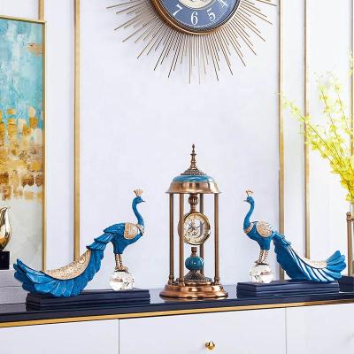 China Sculpture Peacock Clock Art Animal Figurines In Europe Craft Geely Resin Crafts Gifts Combination Modern Luxury Decorations for sale