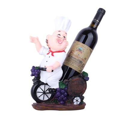 China Funny Resin Crafts Accessories Figurine Decoration Resin Wine Bottle Holder Statues Wine Bottle Holder Home Decor Crafts for sale