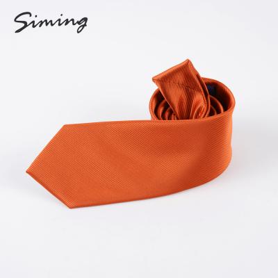 China Unique styled skinny tie for young men solid narrow orange men's neck tie customized high quality low price for sale