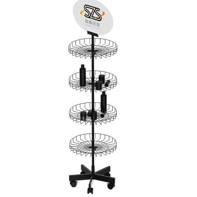 China Display in store or supermarket metal juice bar revolving display rack with four baskets makeup stand cosmetic display perfume bottles rack for sale