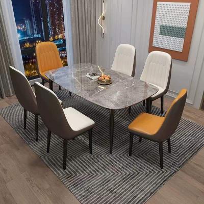 China Morden 2022 Hot Selling New Faux Marble Wood Top Dining Table Modern Minimalist Household 6 /Pu Chair Dining Table Sets. for sale