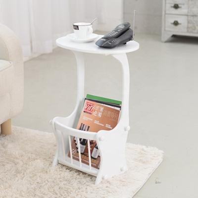 China Modern solid wood side table Fujianhuayi storage rack living room newspaper rack multifunctional side table for sale