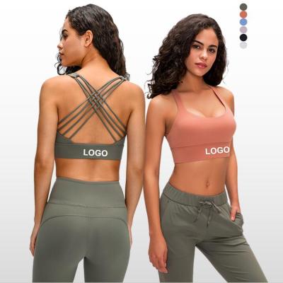 China Breathable Custom Logo Backless Gym Bra Cross Tie Back Sports Bra Girls Backless Sports Bra Top for sale