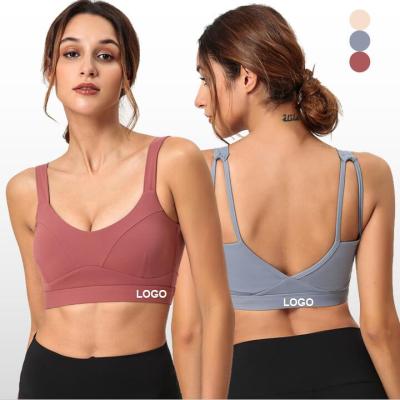 China Breathable Wholesale Naked Sports Bra U Neck Sports Bra Women Patchwork Backless Workout Bra for sale