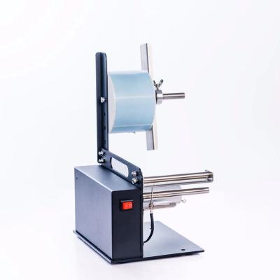 China Desktop Automatic Food Roll Small Label Dispenser Peeling Labeling Machine Dispenser For Sewing Label for sale