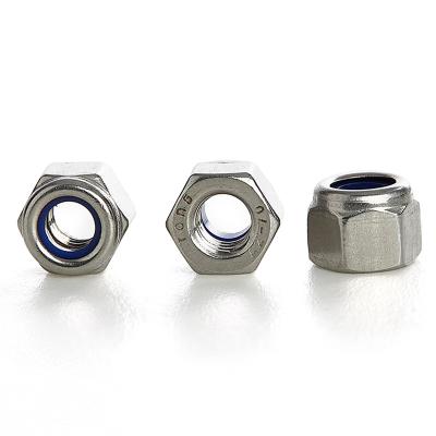 China Buy Heavy Industry Locking Wheel Nuts Insert Lock Nut M8 M10 M12 Stainless Steel Metal Nylon Hex Nut For Toyota BMW for sale