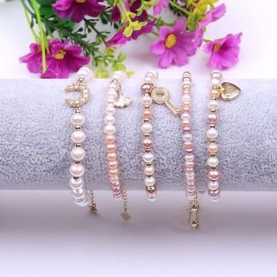 China FASHIONABLE Cute Tiny Head Heart Moon Charms Minimal Delicate Bracelet Corlorful Bead Bracelets Jewelry for sale