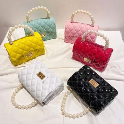 China Fashion 2021 Popular Women Small Jelly Handbags Ladies PVC Handbags Candy Pearl Purses For Females for sale