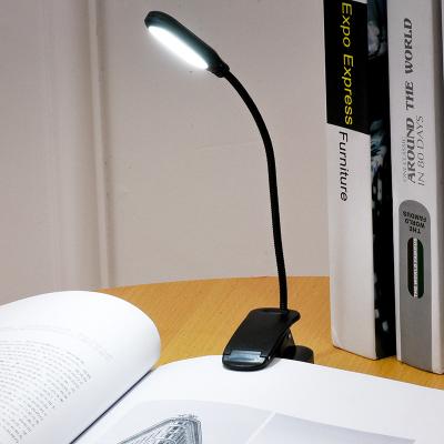 China Modern Mini Clip 1W LED Book Lamp Battery Operated Reading Lamp for sale